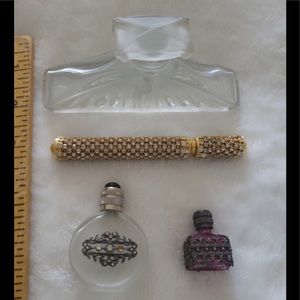 Vintage collectible miniature perfume bottles and rhinestoned pen
